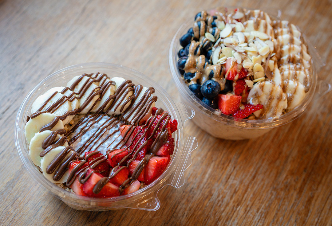 Smoothie and acai bowls topped with fresh fruit in Lexington, Kentucky.
