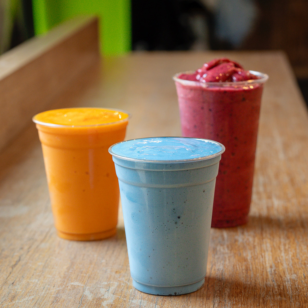 Three vibrant fruit smoothies in Lexington, Kentucky.