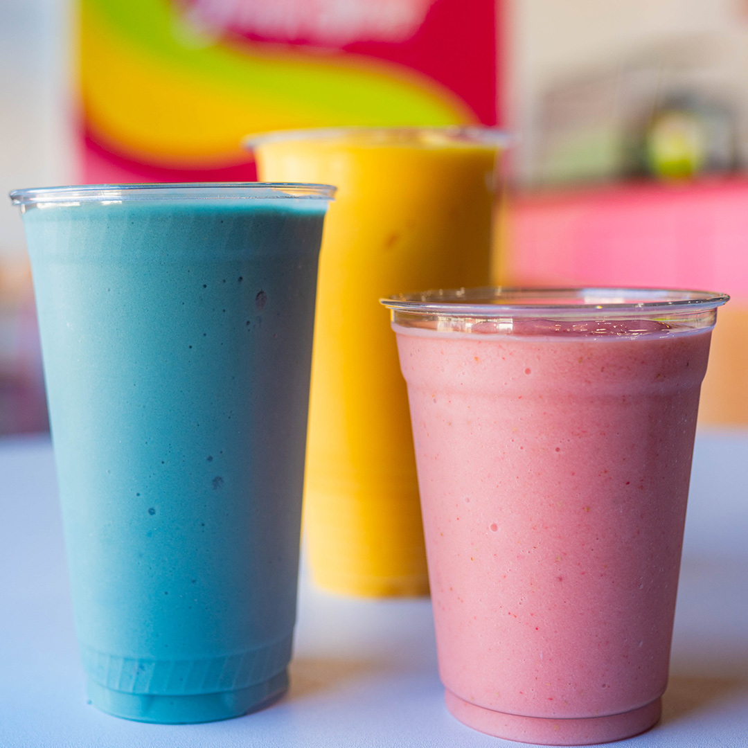 Three vibrant fruit smoothies in Louisville, Kentucky.