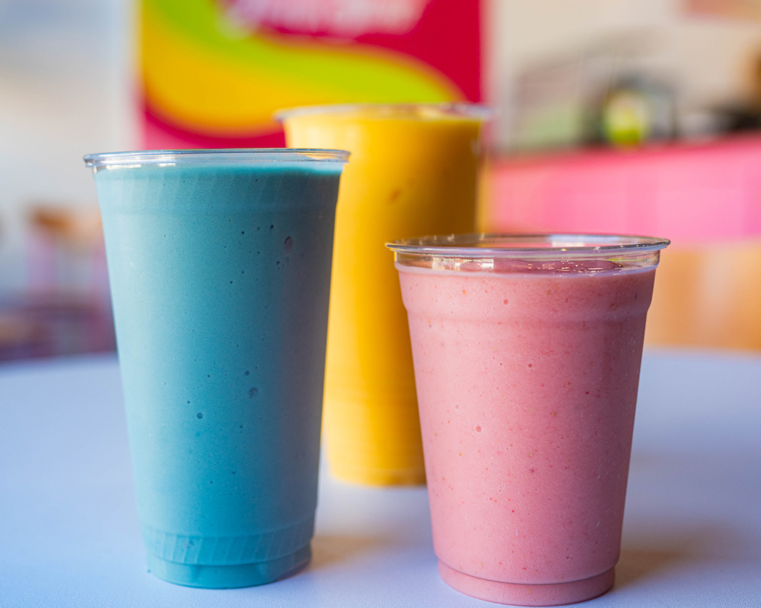 Three vibrant fruit smoothies in Louisville, Kentucky.